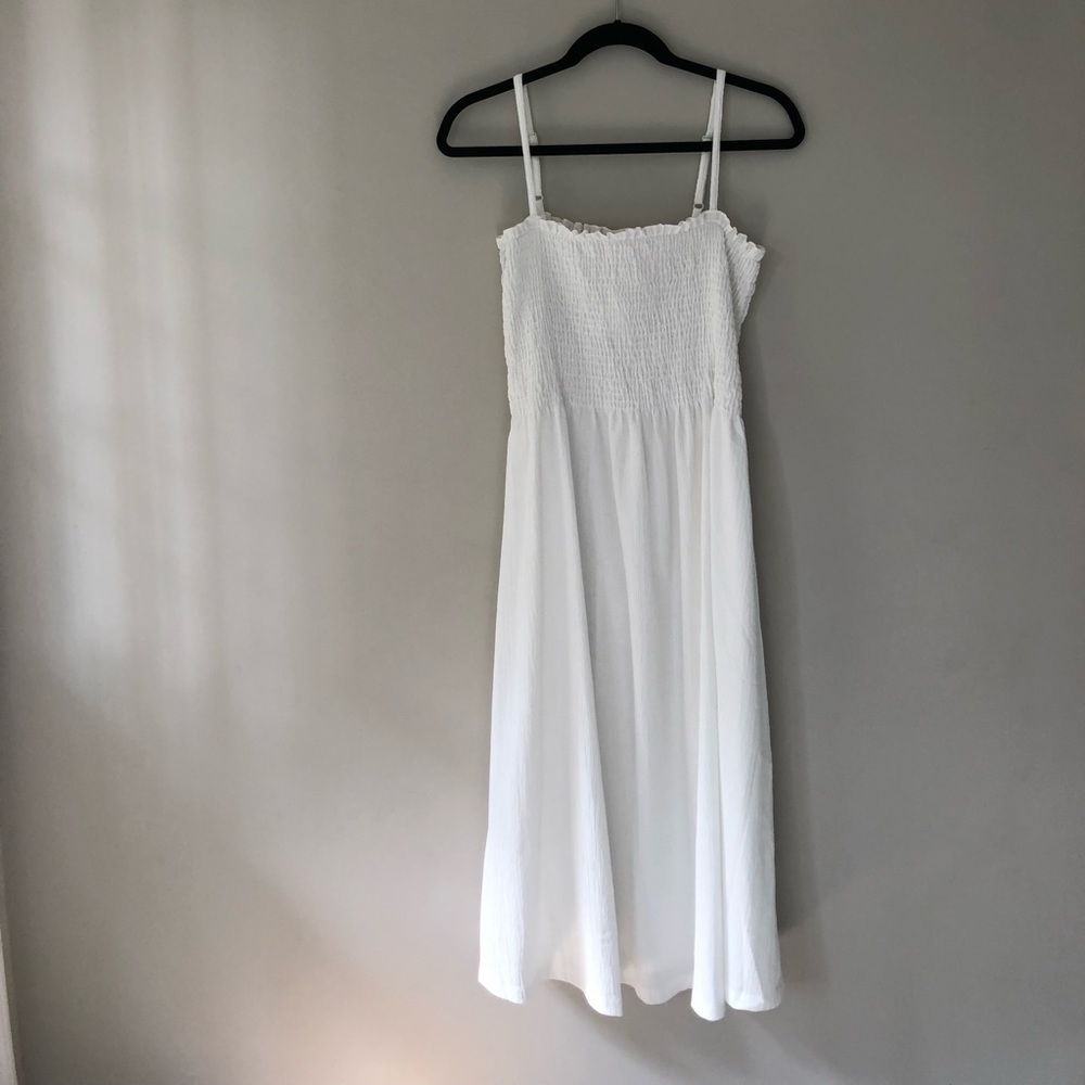 Brand new with tags! White smocked sundress.